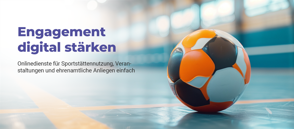 Handball liegt auf dem Boden einer Sporthalle.